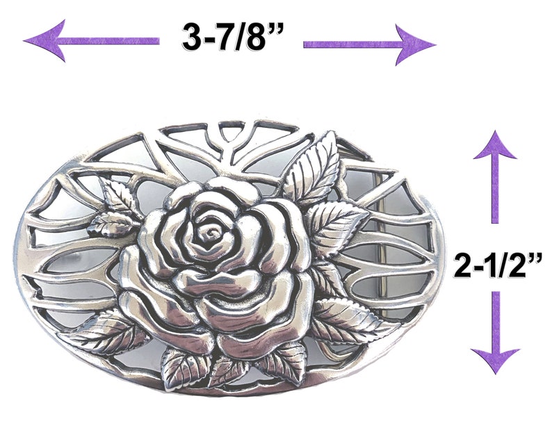 May include: Silver-toned metal belt buckle with a detailed rose design. The buckle measures 3-7/8 inches wide and 2-1/2 inches tall.