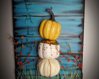 Colgando la pared de calabaza de otoño