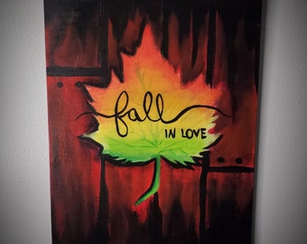 Pared pintada colgando "Fall In Love"