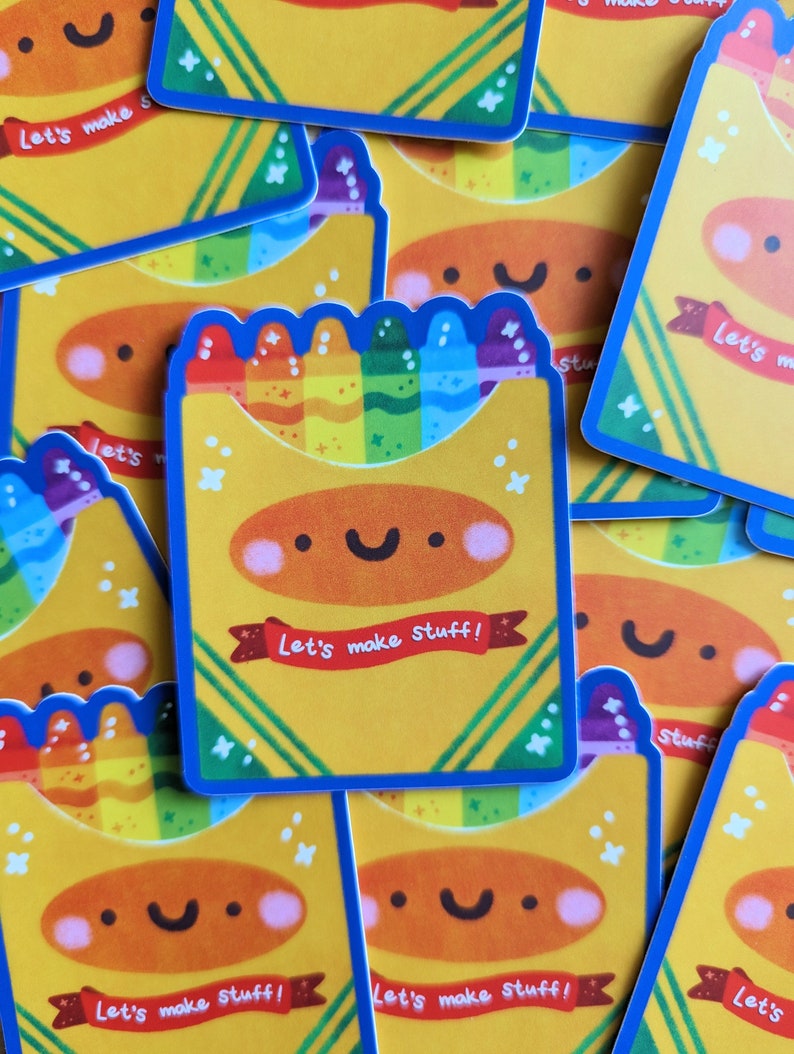 May include: A stack of colorful stickers with a rainbow of crayons and the text "Let's make stuff!" on a yellow background.