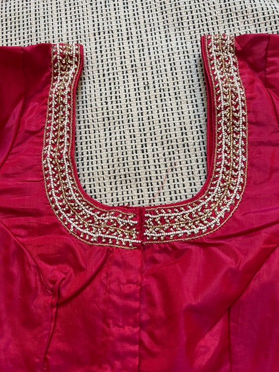 Red embroidered silk blouse|