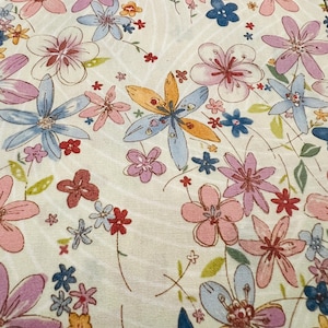 Fabric-“blooming thicket” 2003 Alexander Henry Collection-pink, yellow, blue flowers on white background.