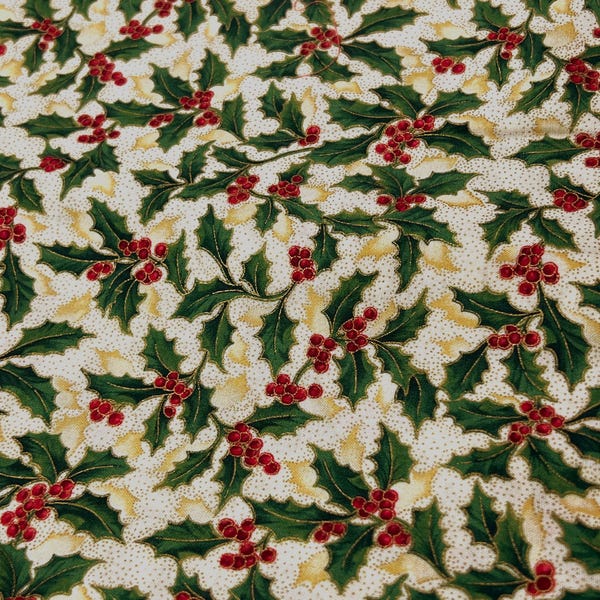 Fabric "Winter Impressions" by Hoffman Intl.  Beautiful! Holly leaves and red berries outlined in metallic gold on gold dusted cream