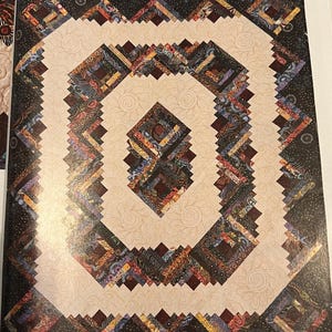 Quilt Kit-Globe Trotter by Kathy Thompson w/aboriginal prints from M&S Textiles. Includes fabric and pattern to make a 57”x 69” quilt.