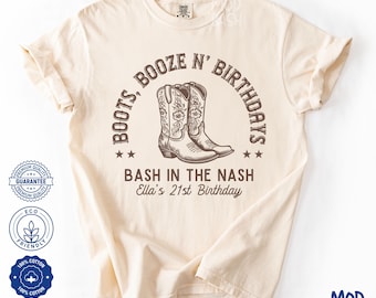 May include: A beige t-shirt with a brown graphic of cowboy boots and the text "Boots, Booze N' Birthdays Bash in the Nash Ella's 21st Birthday".