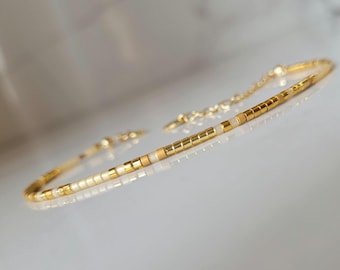 Damesarmband met iriserende gouden Miyuki-kralen | elegante, chique en verfijnde sieraden
