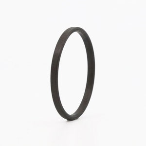 Black Carbon Couture: Exquisite Simplicity and Stackable Elegance - Unveiling the Thin Wedding Ring of Unmatched Comfort