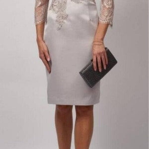 Mascara London Collection dress - This on-trend collection appeals to mothers of the bride / groom of all ages.

The Dress has a concealed zip to the back, it is lined, has padded bust and finished with Embellished beads to the waist