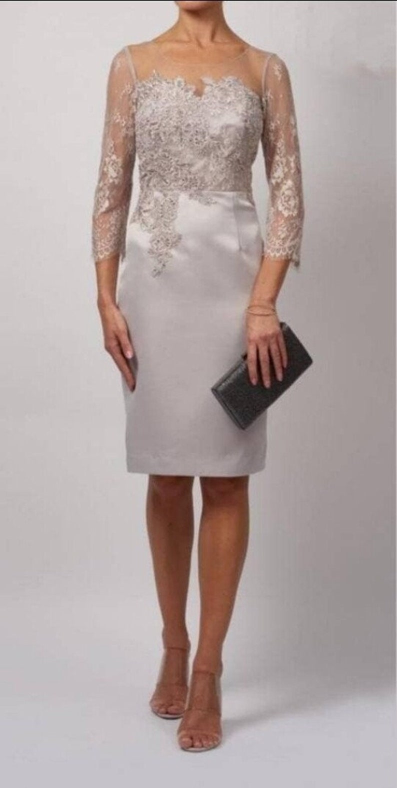 Mascara London Collection dress - This on-trend collection appeals to mothers of the bride / groom of all ages.

The Dress has a concealed zip to the back, it is lined, has padded bust and finished with Embellished beads to the waist