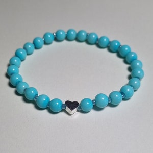 Blue Pearl Bead and Light Blue Seed Bead Stretch Bracelet with Silver Plated Heart Bead