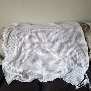 Manta de ganchillo blanco para bebés
