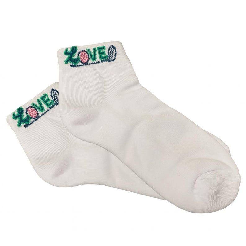 May include: A pair of white ankle socks. The top of each sock features the word "LOVE" embroidered in green, pink, and blue. The socks are made of a soft, comfortable material.