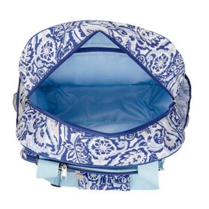 May include: A blue and white paisley patterned travel bag with a light blue interior. The bag has a zipper closure and two handles.