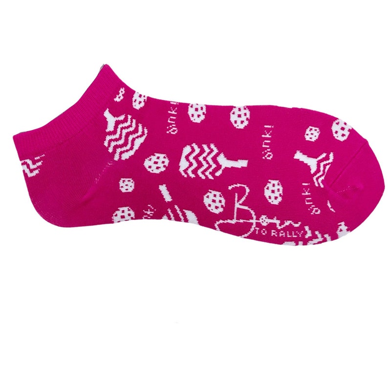 May include: A single fuchsia no-show sock with a white pattern of abstract shapes and the text "Bink!" and "Born to Rally". The sock is designed to be worn with shoes and is made of a soft, comfortable material.