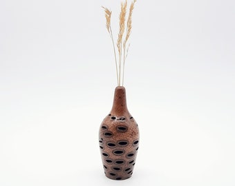 Striking bud vase hand-turned in Banksia Nut