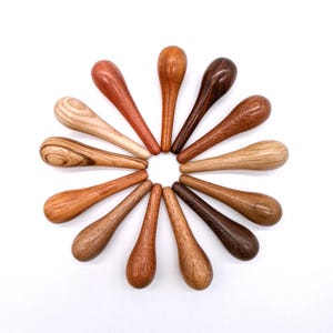 Hand-turned wooden light pull in selection of hardwoods