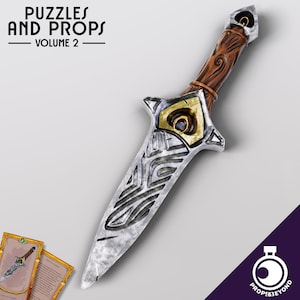 May include: A silver dagger with a wooden handle and intricate carvings. The blade has a gold-colored design and a textured surface. The dagger is a prop for role-playing games and fantasy settings.