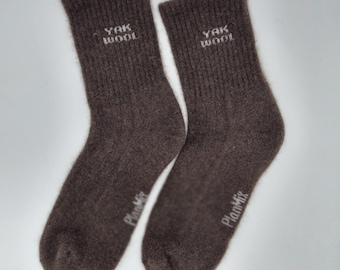 Pack de dos pares de calcetines extra cálidos de lana con diseño acanalado, confeccionados en 100% lana de yak, que retienen el calor y son transpirables. / Las tallas se pueden combinar.