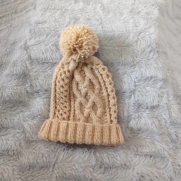 Bonnet enfant beige, avec pompon