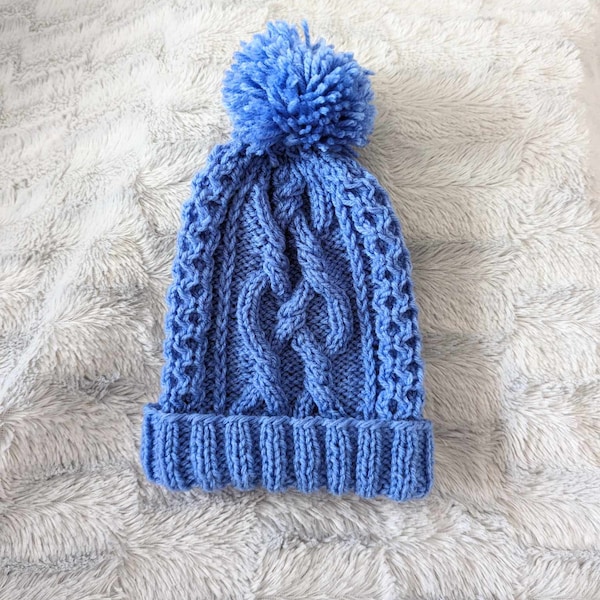 Bonnet enfant bleu pompon