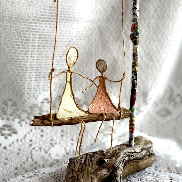 Paper Wire Figures on a Swing
