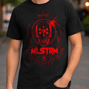 May include: A black short-sleeve t-shirt featuring a red graphic print of a skull centered within a circular target design. The text MLSTRM is printed below the skull, accompanied by circuit board patterns and additional text in English and Japanese.