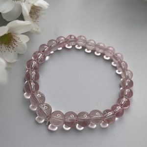 Armband aus klaren rosa Glasperlen