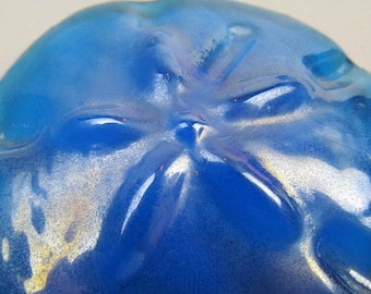 Blue art glass sand dollar paperweight