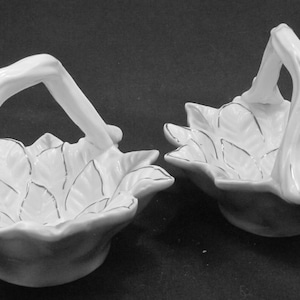 Twin small porcelain Poinsettia handled baskets