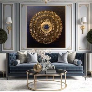 May include: A living room interior design with a blue velvet sofa, a gold metal coffee table, and a large abstract painting with a gold circle on a black background.