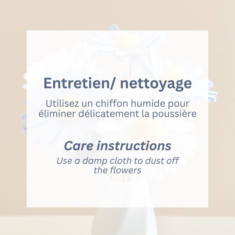 May include: A white square sign with dark blue text that reads Entretien/ nettoyage Utilisez un chiffon humide pour &eacute;liminer d&eacute;licatement la poussi&egrave;re and Care instructions Use a damp cloth to dust off the flowers, set against light blue flowers.