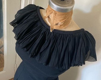 Black 60s shift /  Mad Men-style  crepe wiggle dress with pin-pleat collar