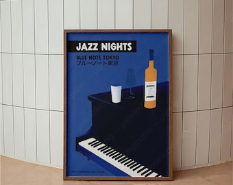 May include: A framed poster with a blue background features the text "JAZZ NIGHTS" and "BLUE NOTE TOKYO" in white. An illustration of a piano, a bottle, and a glass is also included. The poster has a wooden frame.