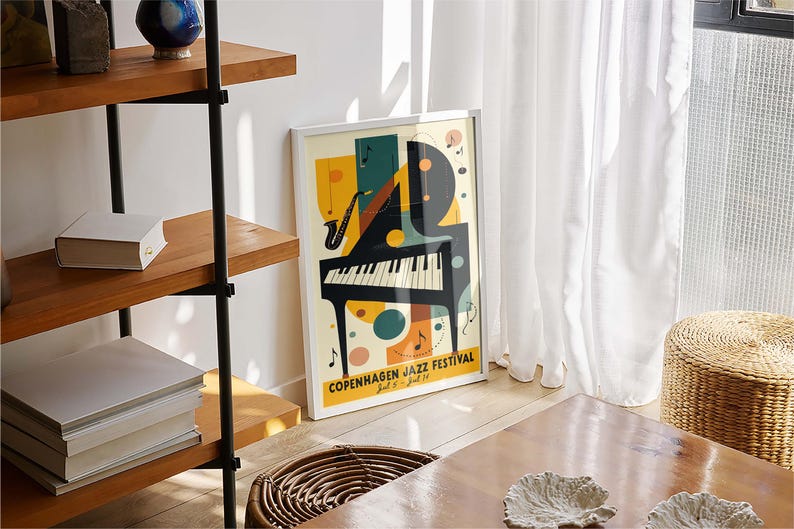 May include: A white framed poster with a colorful abstract design of a piano and a saxophone. The poster reads "Copenhagen Jazz Festival" with the dates "July 8 - July 16".