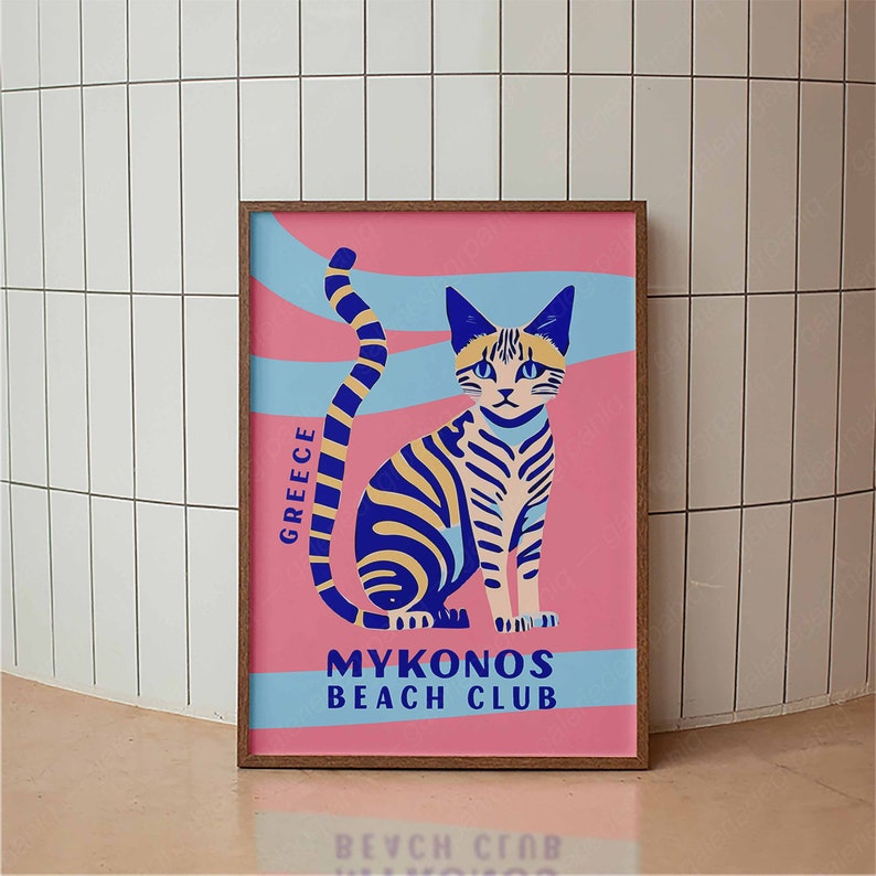 May include: A pink and blue illustrated poster with a stylized cat design. The poster features the text "Greece" and "Mykonos Beach Club".