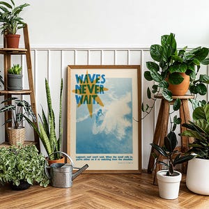 May include: A framed poster with the text "WAVES NEVER WAIT" and a surfer illustration is surrounded by various potted plants. A wooden ladder shelf displays more plants, creating a vibrant, natural interior design.