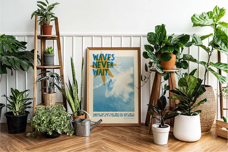 May include: A framed poster with the text "WAVES NEVER WAIT" and a surfer illustration is surrounded by various potted plants. A wooden ladder shelf displays more plants, creating a vibrant, natural interior design.
