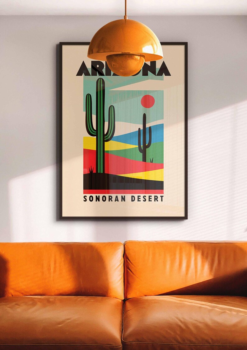 Może przedstawiać: Ramka z plakatem w stylu retro przedstawiającym pustynny krajobraz z dwoma zielonymi kaktusami i tekstem "ARIZONA SONORAN DESERT".