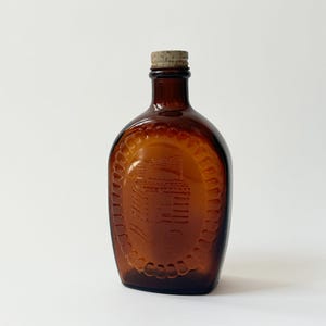 Vintage Dark Browl Glas Blockhaus Sirup Bicentennial Glasbehälter mit Top