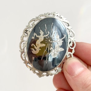 Siam Sterling Silver Mekkalah & Ramasoon Featured Oval Shaped Vintage Hand Carved Thai Made Handmade Nielloware Brooch Pin