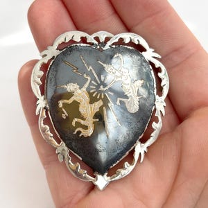 Siam Sterling Silver Mekkalah & Ramasoon Featured Heart Shaped Vintage Hand Carved Thai Made Handmade Nielloware Brooch Pin