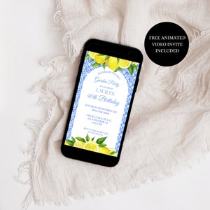 May include: A digital invitation on a smartphone screen for a garden party to celebrate Laura's 40th birthday. The invitation features a blue and white floral pattern with lemons and green leaves. The text on the invitation reads "Please join us for a Garden Party to celebrate Laura's 40th Birthday. Saturday September 7th 3PM onwards. A Really Nice Place 123 Anywhere St Any City. RSVP to [email protected] on [phone number]"