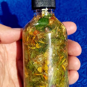 Money Ritual Oil, spell Prosperity Conjure Oil with Herbs, Gems, Gold Leaf 4oz Dropper Bottle Wealth Attraction Hoodoo Oil handmade money drawing ritual oil, afro atlantic prosperity conjure blend, wealth attraction feng shui rootwork oil, handcrafted spell oil with herbs and stones, 24k gold leaf magical abundance oil, magick intention oil for money success, financial prosperity ritual anointing oil money drawing oil, conjure hoodoo, prosperity spell oil, wealth ritual oil, rootwork abundance