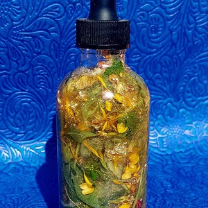 Money Ritual Oil, spell Prosperity Conjure Oil with Herbs, Gems, Gold Leaf 4oz Dropper Bottle Wealth Attraction Hoodoo Oil handmade money drawing ritual oil, afro atlantic prosperity conjure blend, wealth attraction feng shui rootwork oil, handcrafted spell oil with herbs and stones, 24k gold leaf magical abundance oil, magick intention oil for money success, financial prosperity ritual anointing oil money drawing oil, conjure hoodoo, prosperity spell oil, wealth ritual oil, rootwork abundance