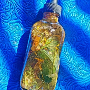 Money Ritual Oil, spell Prosperity Conjure Oil with Herbs, Gems, Gold Leaf 4oz Dropper Bottle Wealth Attraction Hoodoo Oil handmade money drawing ritual oil, afro atlantic prosperity conjure blend, wealth attraction feng shui rootwork oil, handcrafted spell oil with herbs and stones, 24k gold leaf magical abundance oil, magick intention oil for money success, financial prosperity ritual anointing oil money drawing oil, conjure hoodoo, prosperity spell oil, wealth ritual oil, rootwork abundance