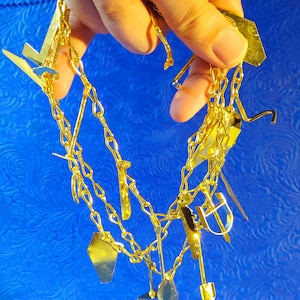 Oshun Ashaba chain Gold tools orisha yoruba Logun Ede Osun Oshogbo Ogun Yemaya Pinaldo bronze machete Ocha Oxum Logunede Ponda statue inle