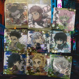 Veel van 9 Demon Slayer KNY-stickers met misvormde wafels uit Japan, met hashira en iconische personages! Holografisch ontwerp: verzending in de VS via UPS