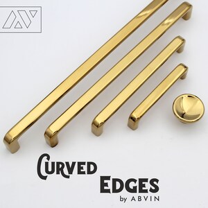 May include: Four gold-toned cabinet pulls with curved edges and a single gold-toned knob. The pulls are arranged in a row from largest to smallest. The text "CURVED EDGES by ABVIN" is at the bottom of the image.