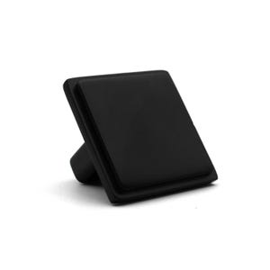 May include: A matte black cabinet knob featuring a square-shaped front face with rounded edges. The hardware has a stepped design with a smaller square base that connects to the larger top surface, providing a clean and uniform appearance.