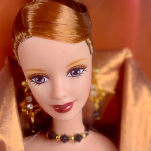 Vintage Barbie BRONZE SENSATION Barbie  1998 Special Edition  Never Removed from Box Vintage Barbie  New in Box. Made in Indonesia